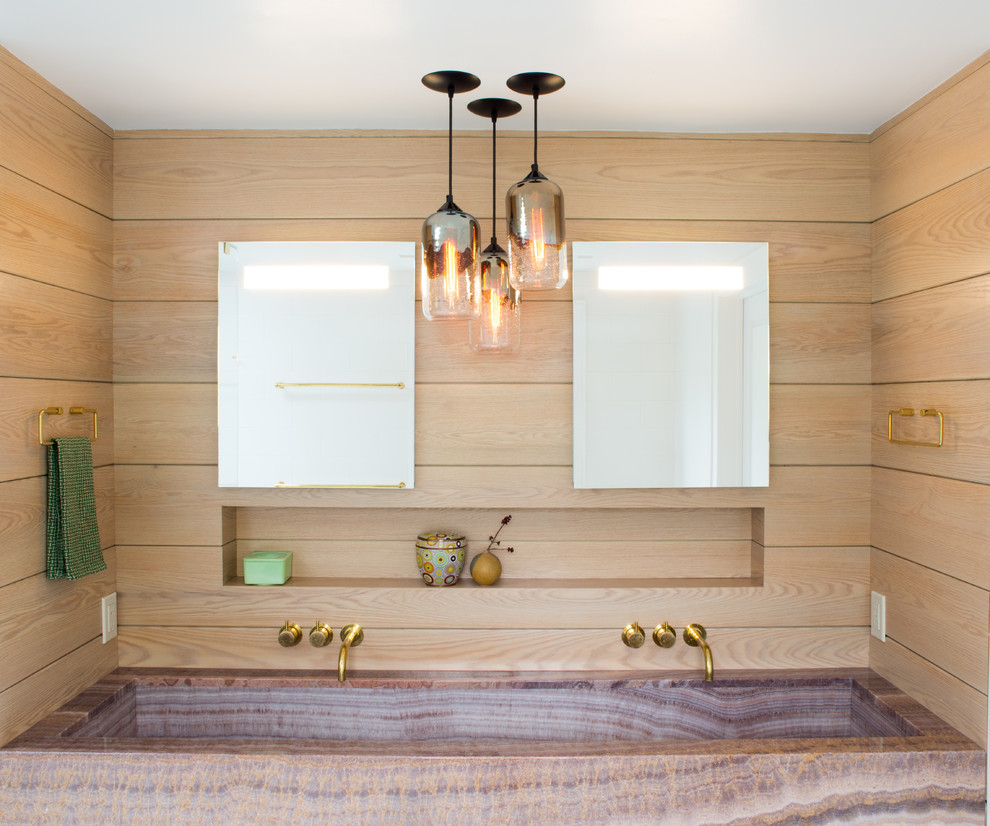 Design ideas for a mid-sized modern master bathroom in New York with flat-panel cabinets, medium wood cabinets, an alcove shower, a trough sink, white floor, brown tile, multi-coloured tile, stone slab, onyx benchtops, a hinged shower door and brown benchtops.