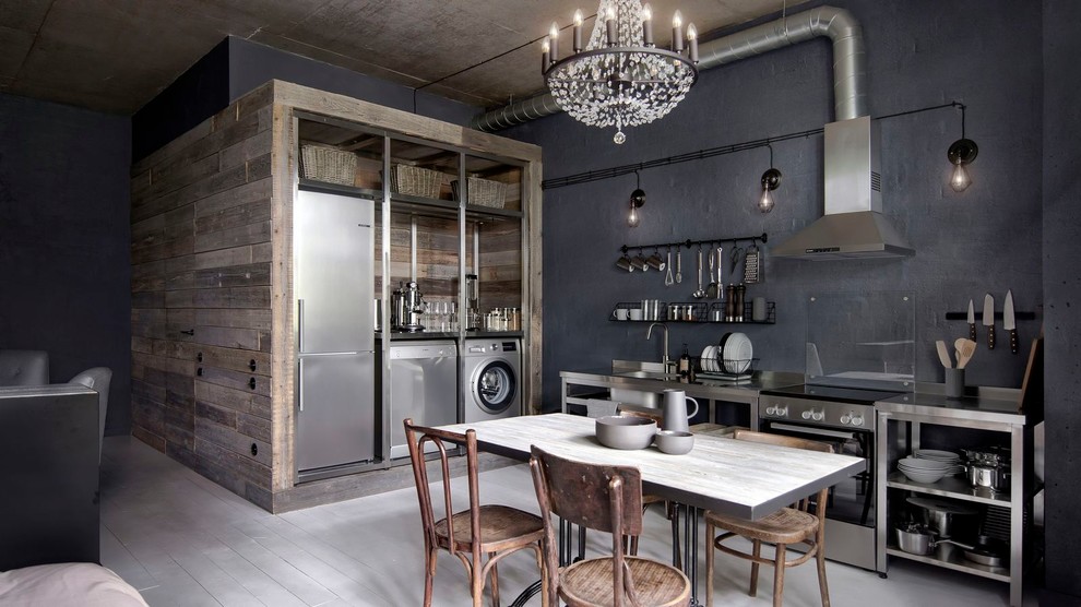 Inspiration for a small industrial single-wall open plan kitchen in Moscow with open cabinets, stainless steel cabinets, stainless steel benchtops, stainless steel appliances, painted wood floors, no island, white floor, a drop-in sink, grey benchtop and black splashback.