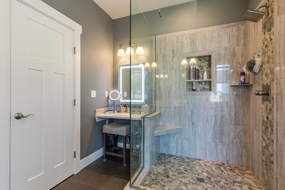 Design ideas for an arts and crafts master bathroom in Seattle with shaker cabinets, white cabinets, a drop-in tub, a corner shower, gray tile, marble, grey walls, slate floors, an undermount sink, engineered quartz benchtops, grey floor, a hinged shower door and white benchtops.