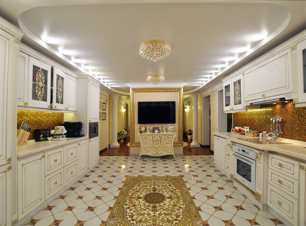 This is an example of a traditional galley open plan kitchen in Yekaterinburg with raised-panel cabinets, white cabinets, yellow splashback, white appliances and no island.