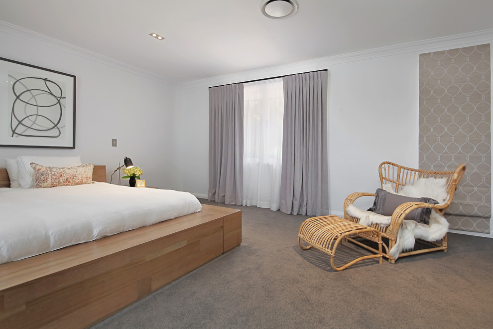 Design ideas for a contemporary bedroom in Sydney with white walls, carpet and grey floor.