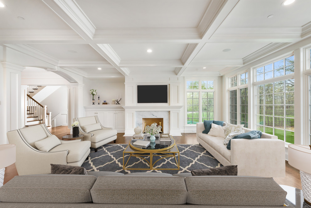 Large transitional family room in Chicago with white walls, dark hardwood floors, a standard fireplace, a stone fireplace surround and a wall-mounted tv.