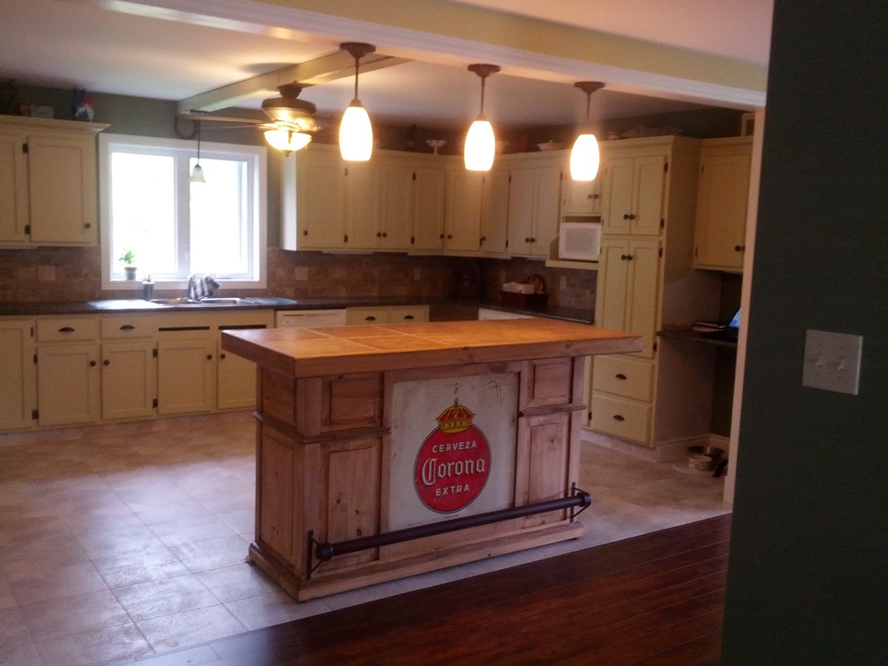 Example of a mountain style kitchen design in Ottawa