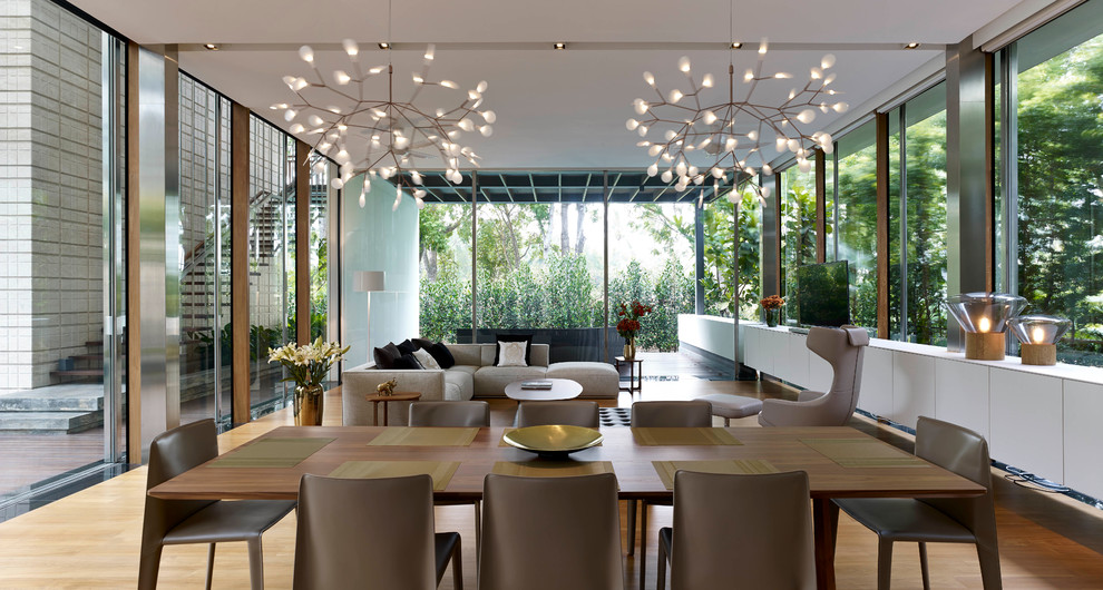Inspiration for a contemporary open plan dining in Singapore.