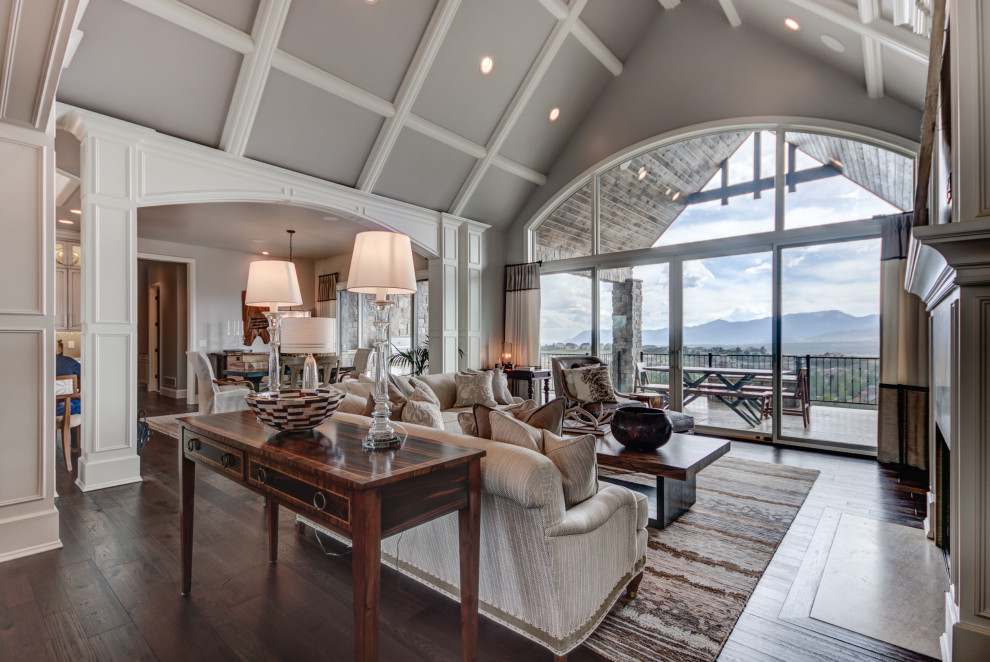 Example of a transitional home design design in Denver