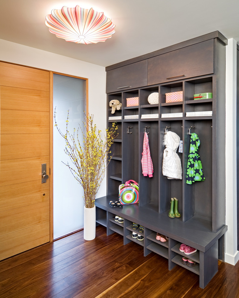 Photo of a contemporary mudroom in San Francisco with medium hardwood floors.