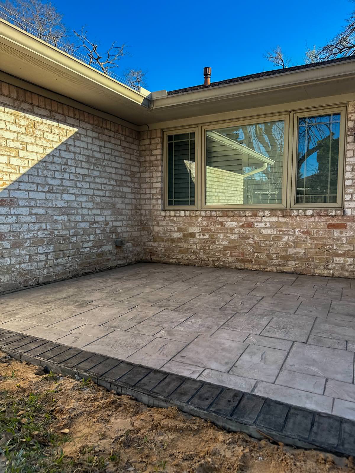 New driveway with sidewalks and stamped concrete!