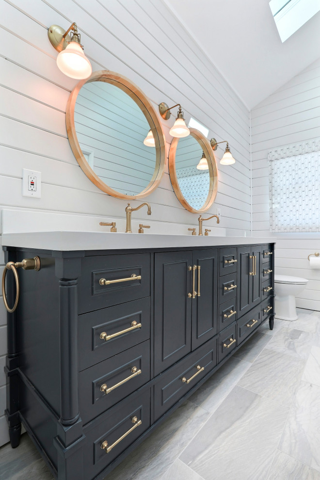 Inspiration for a medium sized nautical ensuite bathroom in Other with blue cabinets, a freestanding bath, a built-in shower, white walls, a submerged sink, engineered stone worktops, grey floors, an open shower, white worktops, double sinks and a freestanding vanity unit.