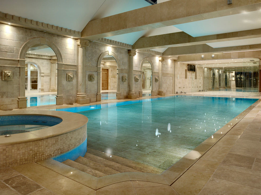 Design ideas for a traditional indoor rectangular pool in London.