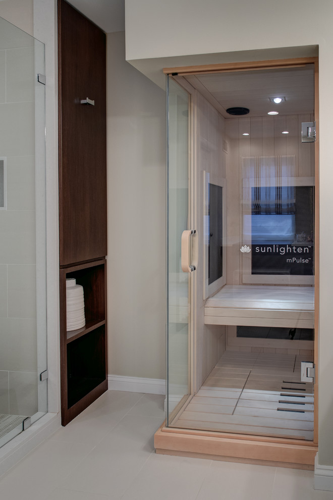 Large minimalist master gray tile home design photo with an integrated sink, flat-panel cabinets, dark wood cabinets and gray walls