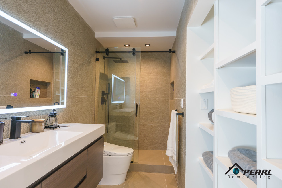 Photo of a small modern master bathroom in Los Angeles with flat-panel cabinets, brown cabinets, an alcove shower, a one-piece toilet, green tile, stone tile, grey walls, ceramic floors, a drop-in sink, solid surface benchtops, beige floor, a sliding shower screen, white benchtops, a niche, a single vanity, a floating vanity and vaulted.