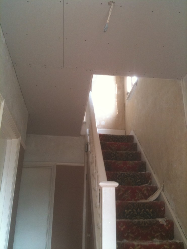 Inspiration for a mid-sized traditional staircase in Hampshire.