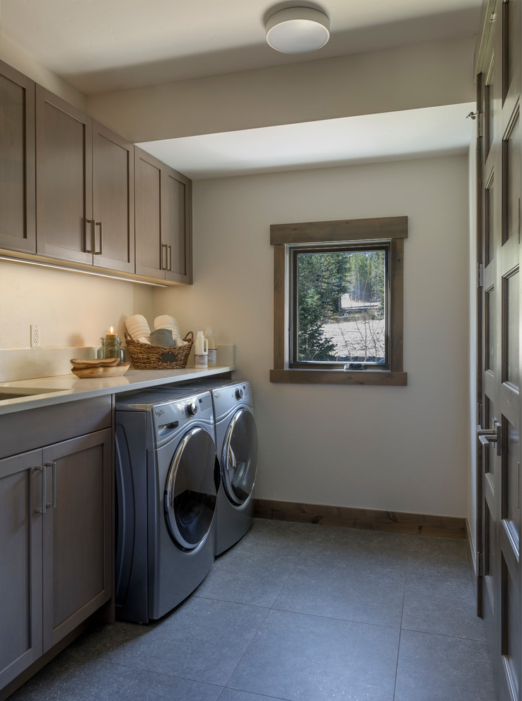 Design ideas for a large modern dedicated laundry room in Seattle.
