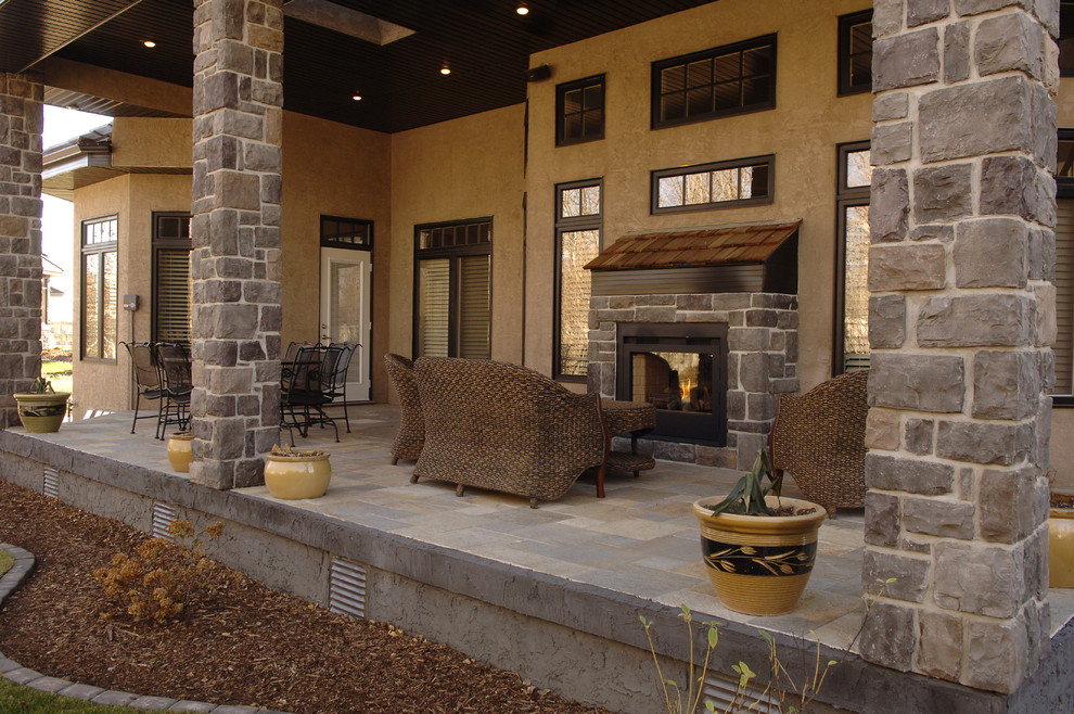 Example of a transitional home design design in Edmonton