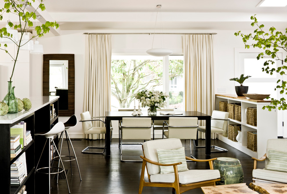 Inspiration for a midcentury dining room in Portland with white walls.