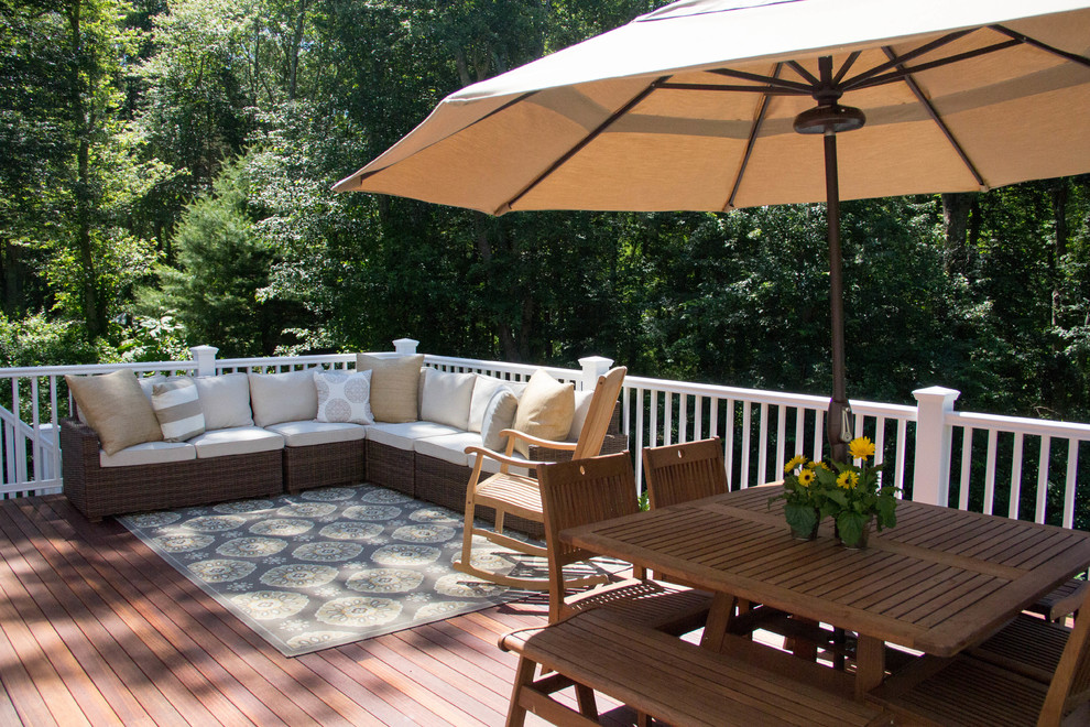 Mid-sized traditional backyard deck in Providence.