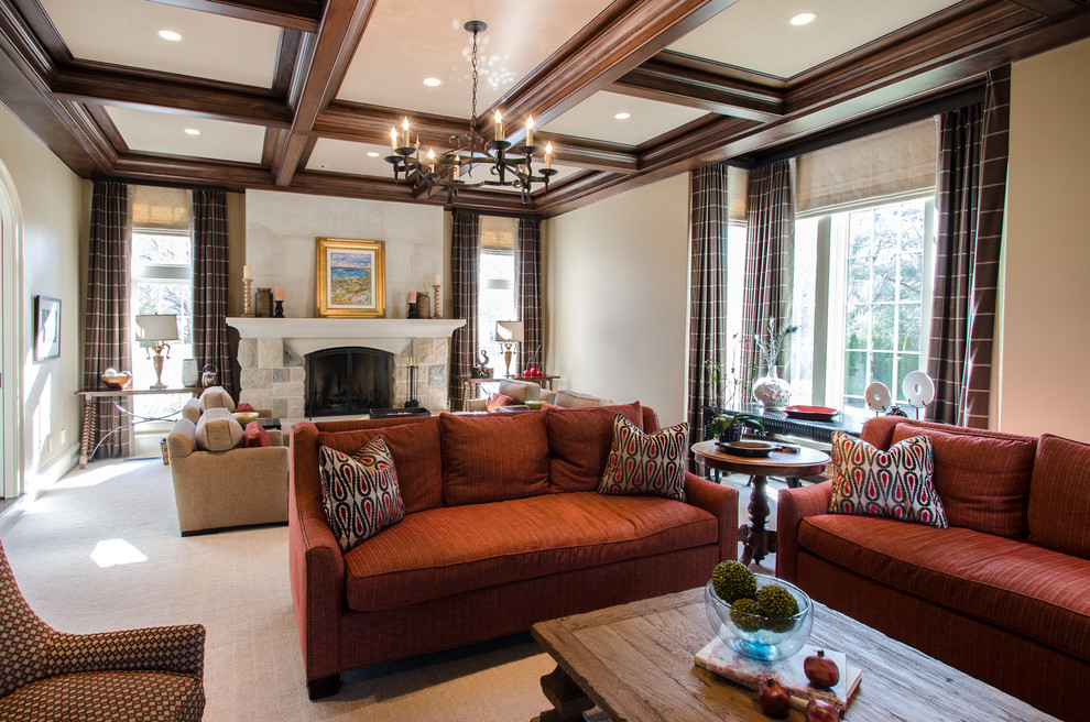 Photo of a large traditional enclosed family room in Nashville with white walls, carpet, a standard fireplace and a stone fireplace surround.