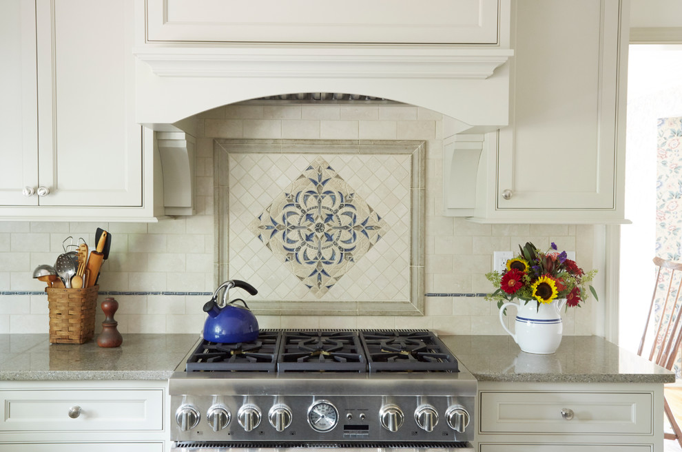 Inspiration for a mid-sized transitional u-shaped ceramic tile and beige floor eat-in kitchen remodel in Philadelphia with a farmhouse sink, beaded inset cabinets, beige cabinets, beige backsplash, ceramic backsplash, stainless steel appliances and an island