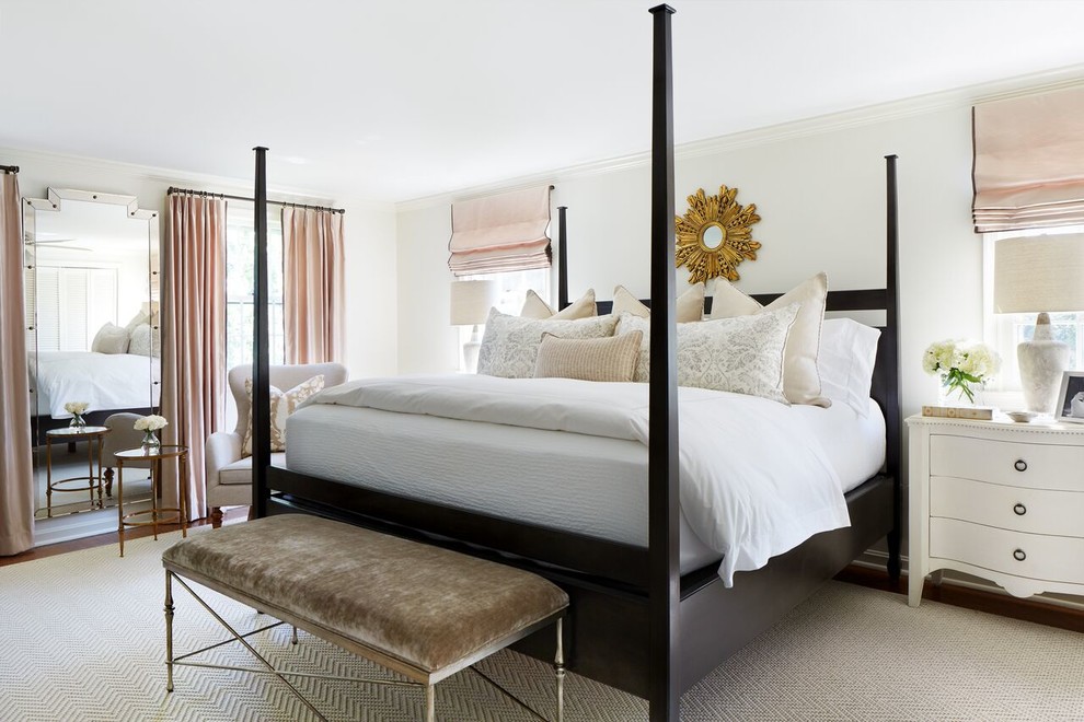 Mid-sized transitional master brown floor bedroom photo in DC Metro with white walls