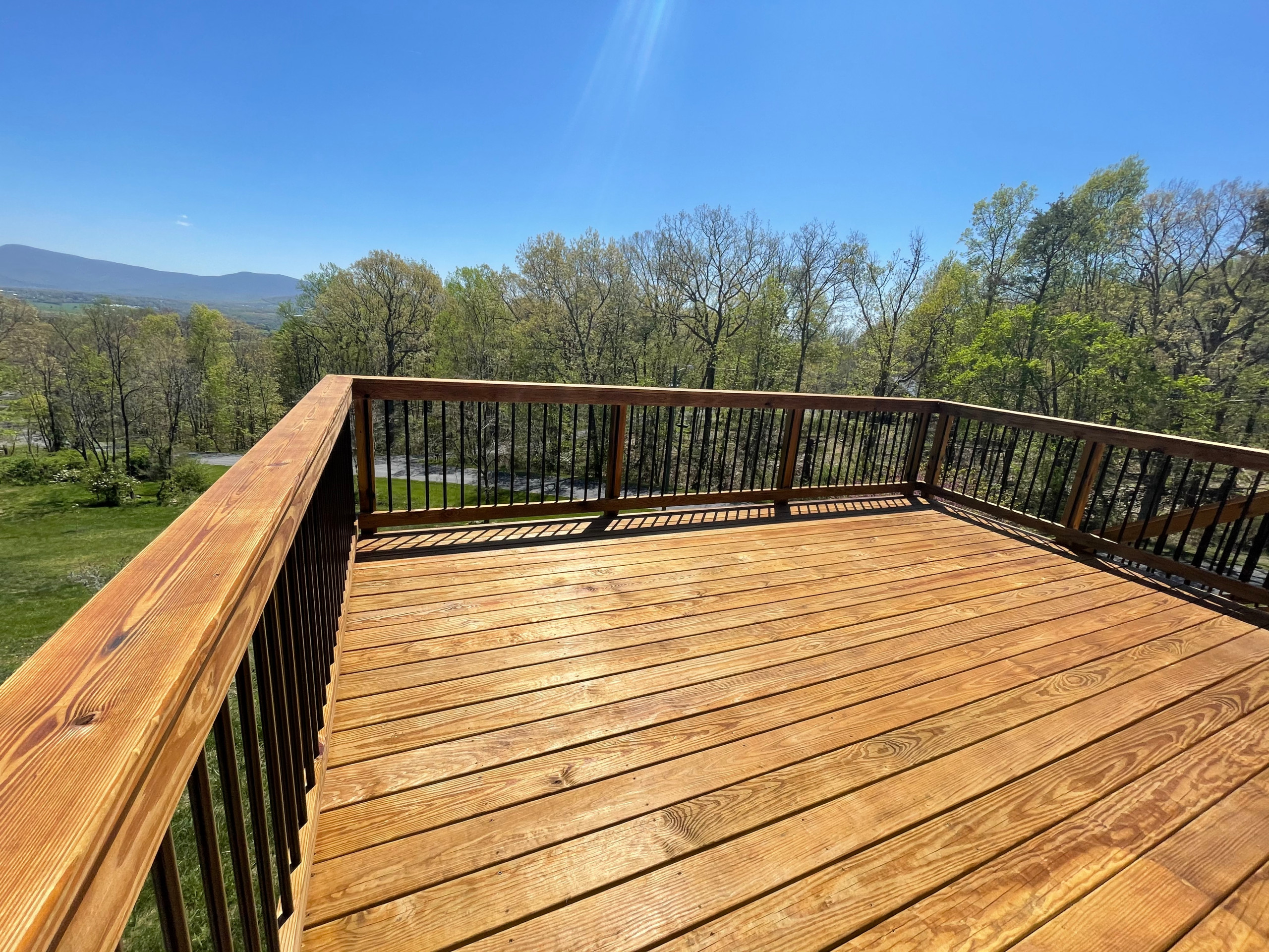 Deck stain and gutters power wash