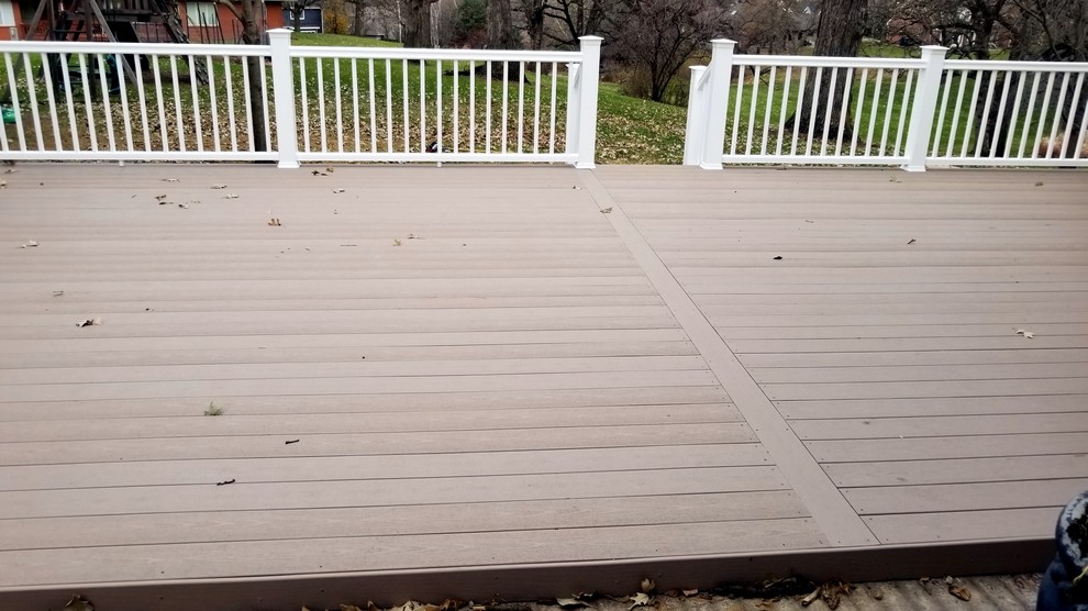 Large backyard deck photo with no cover