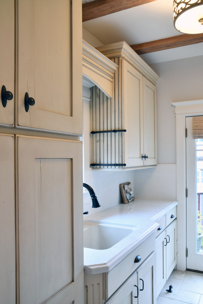 Design ideas for a traditional laundry room in San Diego.