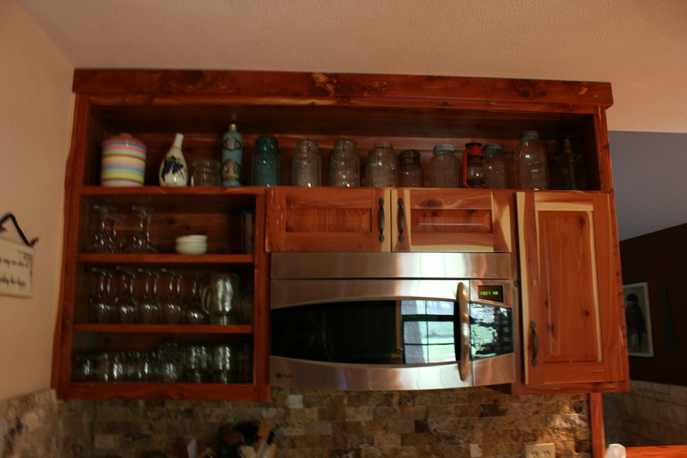 Example of a mountain style kitchen design in Austin