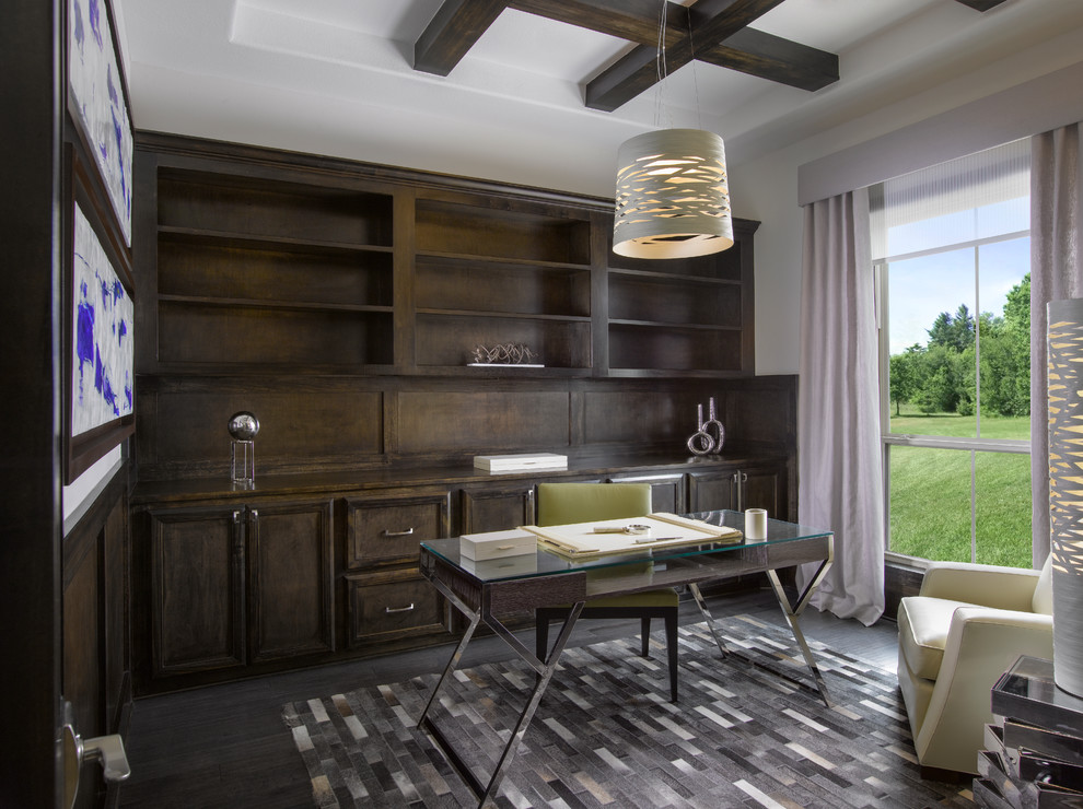 Inspiration for a large transitional built-in desk dark wood floor study room remodel in Houston with white walls