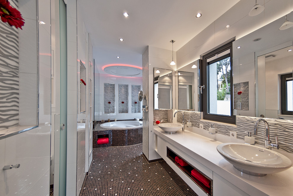 Expansive eclectic master bathroom in Palma de Mallorca with flat-panel cabinets, white cabinets, a hot tub, an alcove shower, white walls and a vessel sink.