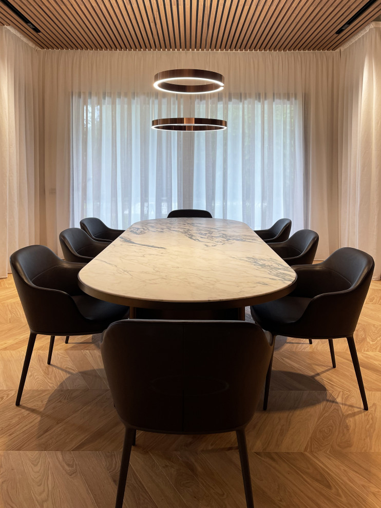 This is an example of a contemporary dining room in Milan.