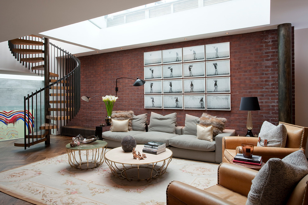 Transitional basement in London with dark hardwood floors, no fireplace and brown floor.