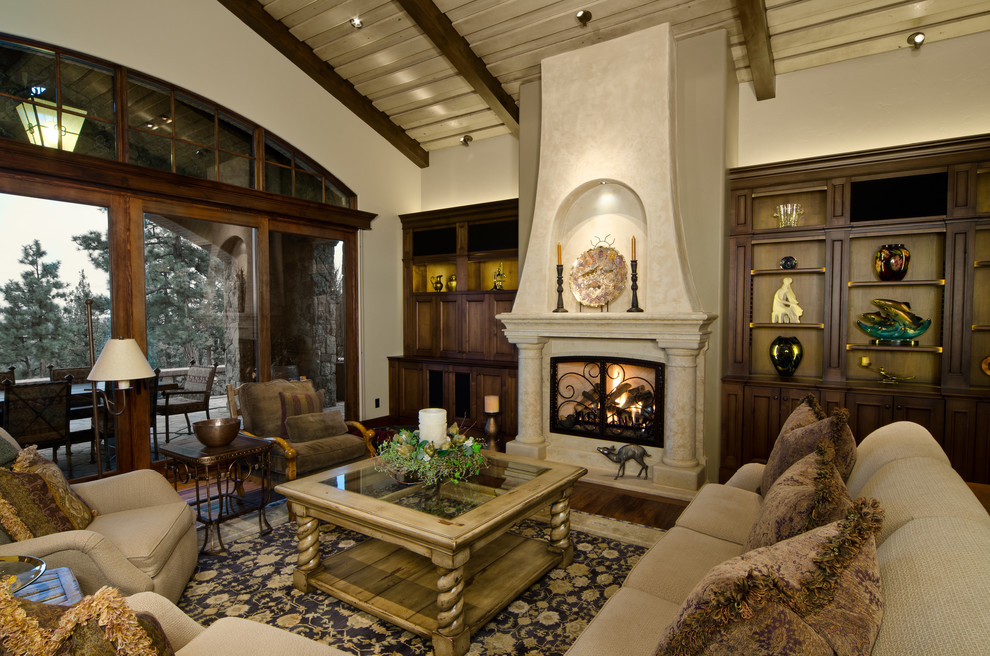 Inspiration for a large mediterranean living room in Portland with a standard fireplace.