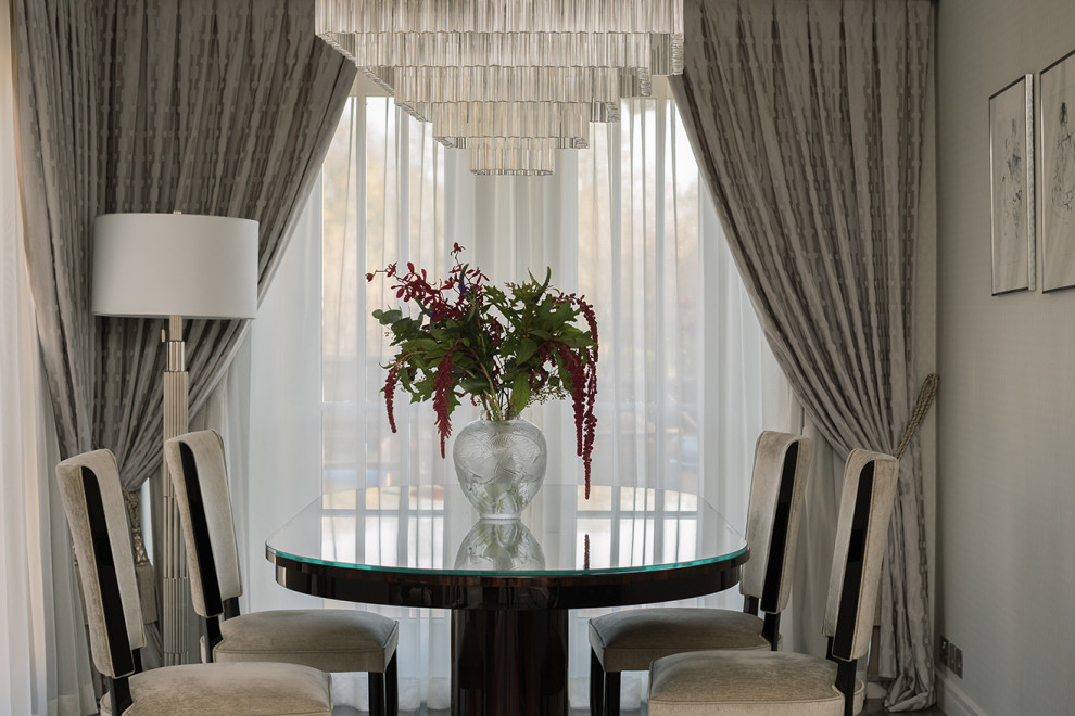 Example of a large transitional dining room design in London