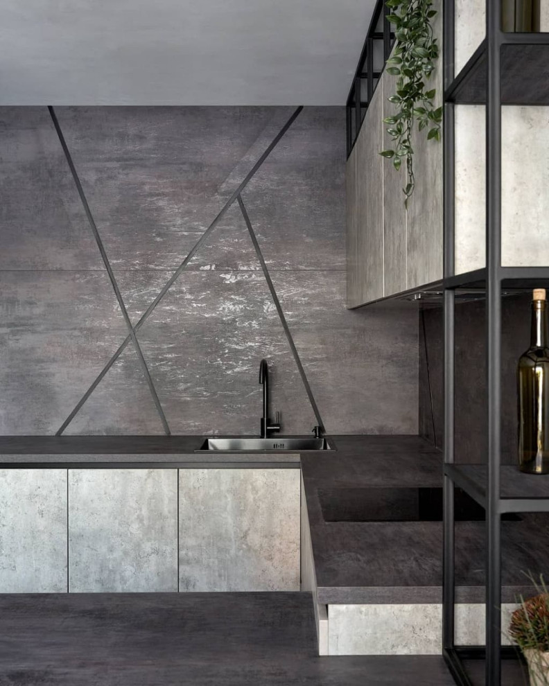 Дизайнерская угловая кухня серого цвета в стиле лофт с барной стойкой