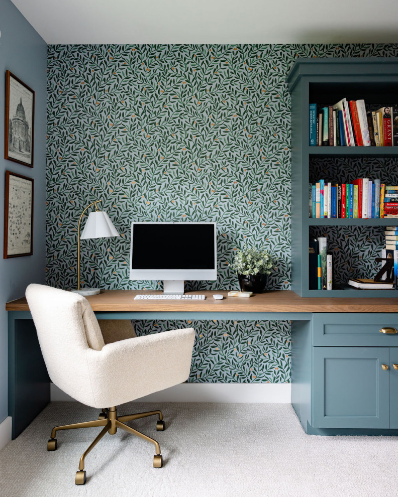 Example of a transitional home office design in Chicago