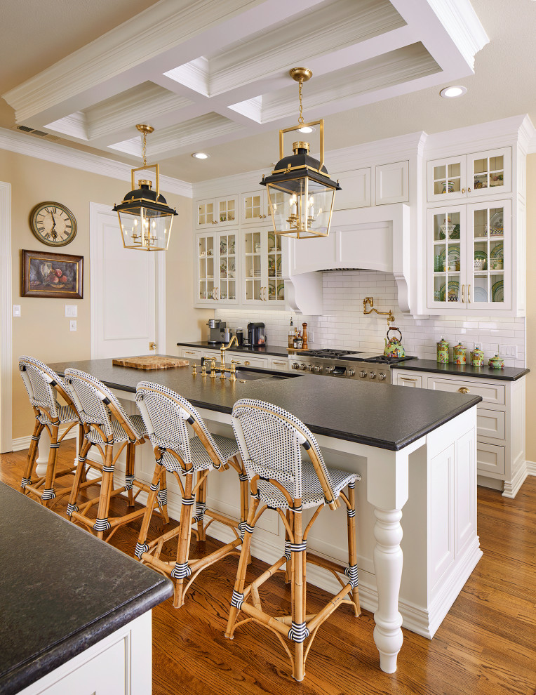 Kitchen - large traditional galley coffered ceiling kitchen idea in Dallas with an island
