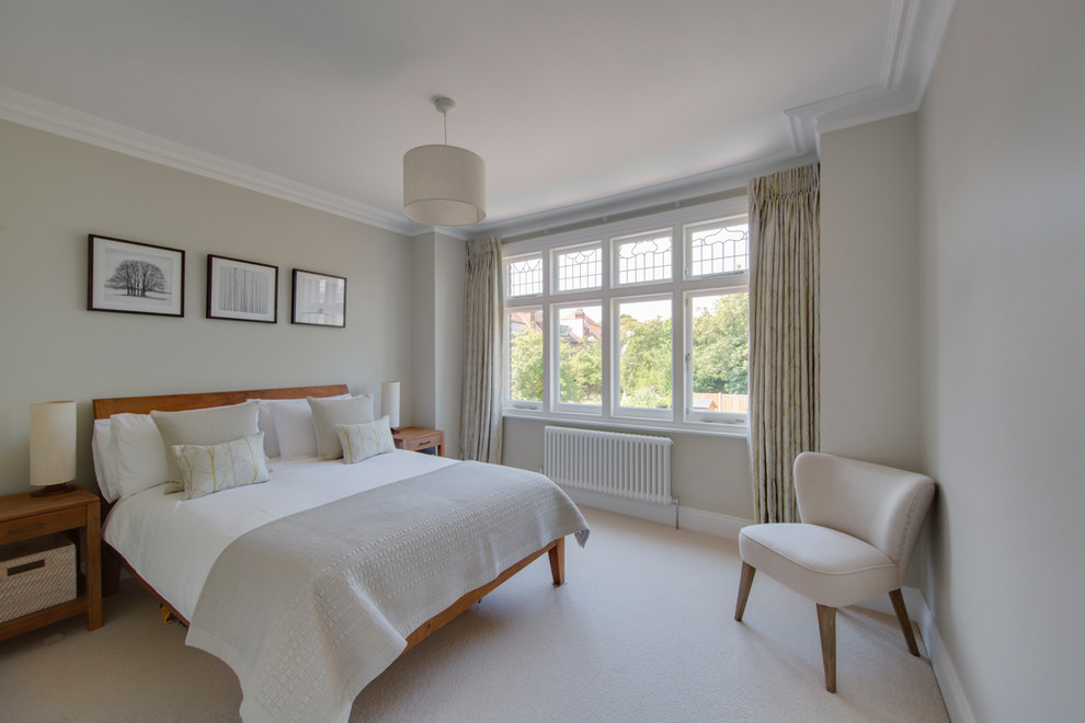 This is an example of a medium sized contemporary bedroom in London.