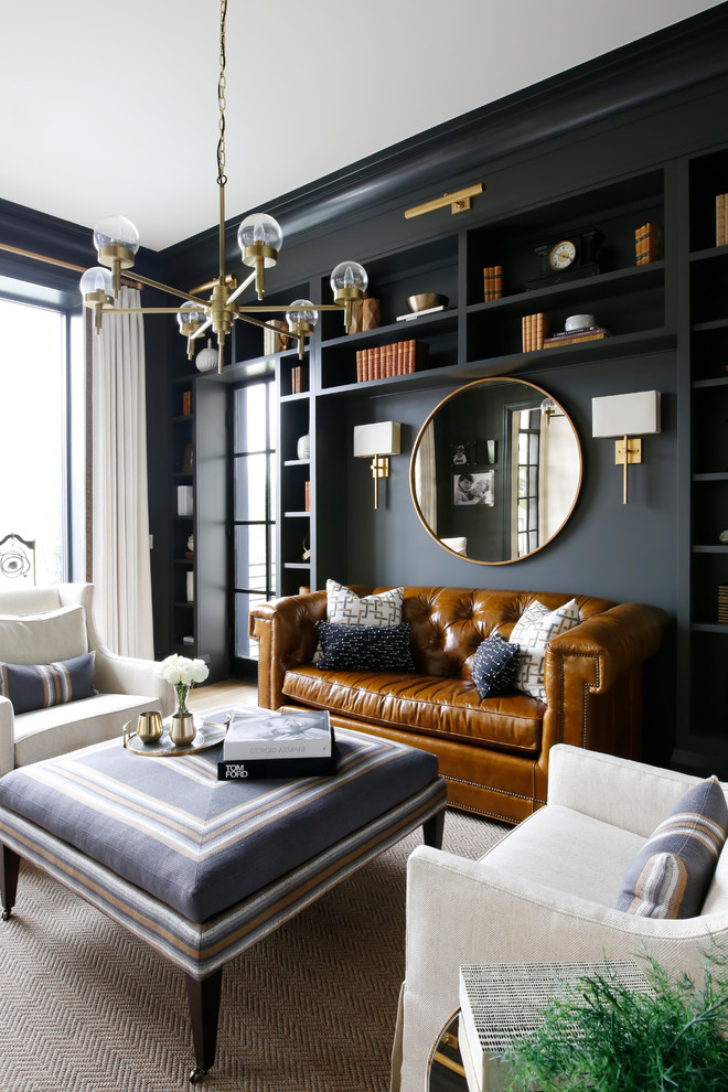 Inspiration for a transitional formal enclosed living room in Nashville with black walls and light hardwood floors.