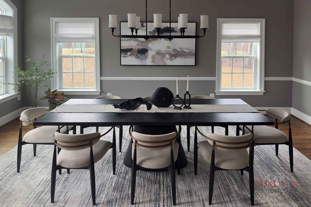 Large transitional medium tone wood floor and brown floor kitchen/dining room combo photo with gray walls