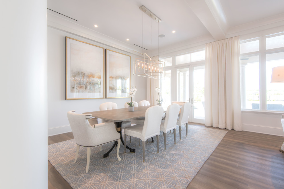 Design ideas for a large transitional open plan dining in Tampa with grey walls, light hardwood floors and brown floor.