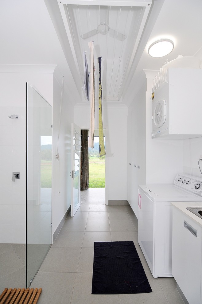 Design ideas for a contemporary laundry room in Cairns.