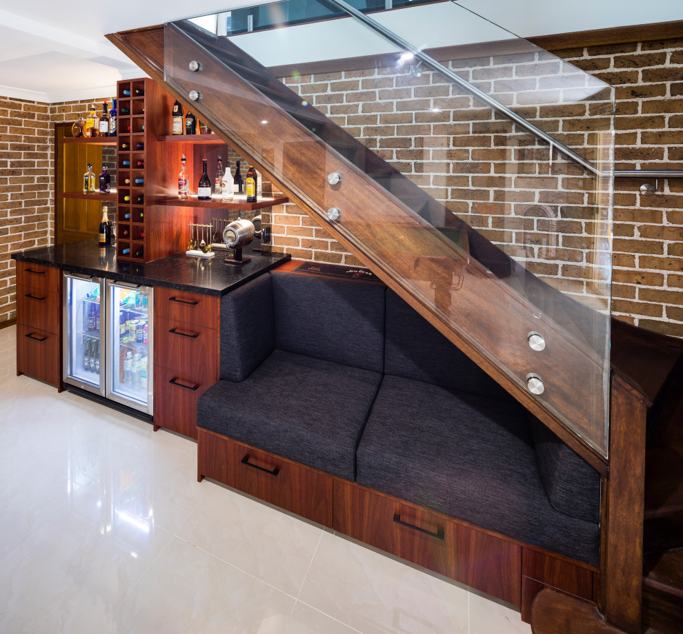 Inspiration for a modern wine cellar in Sydney with display racks.