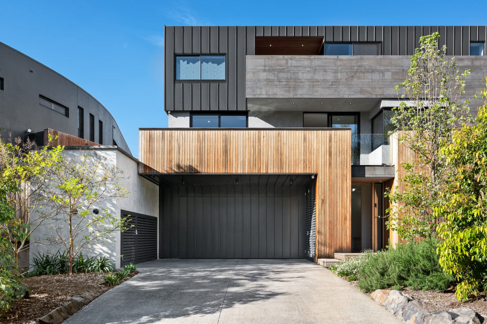 Inspiration for an expansive contemporary attached one-car garage in Melbourne.