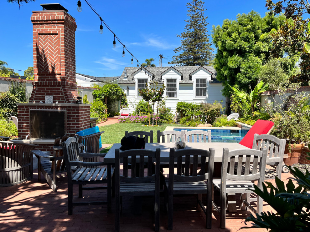Photo of a traditional One-story exterior in San Diego With Concrete Fiberboard Siding and a Gable Roof.