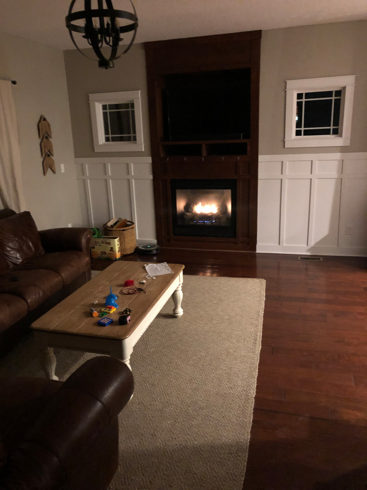 Fireplace not centered between windows.