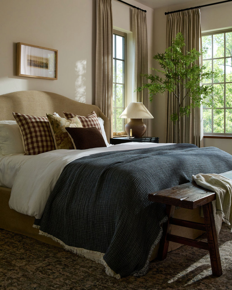 Inspiration for a country bedroom remodel in Oklahoma City with beige walls