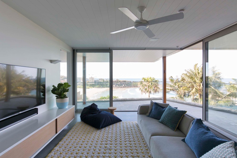 Beach style living room in Sydney.