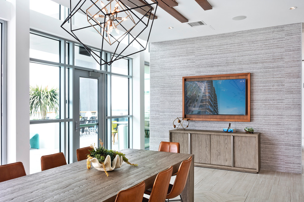 Design ideas for a contemporary dining room in Los Angeles with white walls and light hardwood floors.
