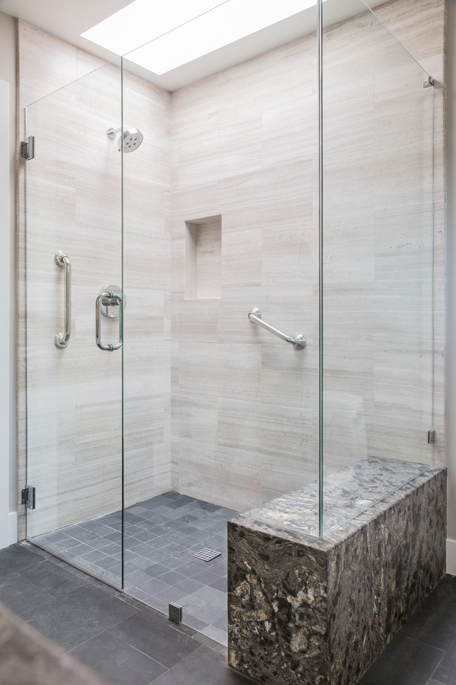Traditional bathroom in Orange County with an alcove shower, beige tile, porcelain tile, beige walls, ceramic floors, grey floor and a hinged shower door.