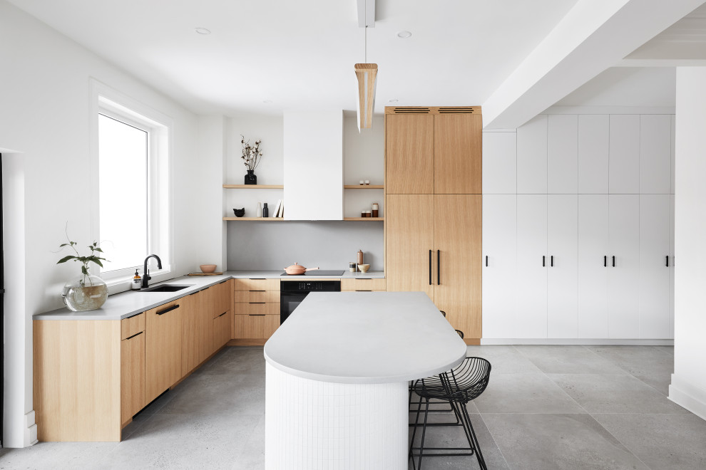 This is an example of a scandinavian kitchen pantry in Montreal with white cabinets, wood benchtops and white benchtop.